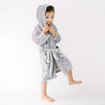 Load image into Gallery viewer, Girl wearing soft grey hooded robe
